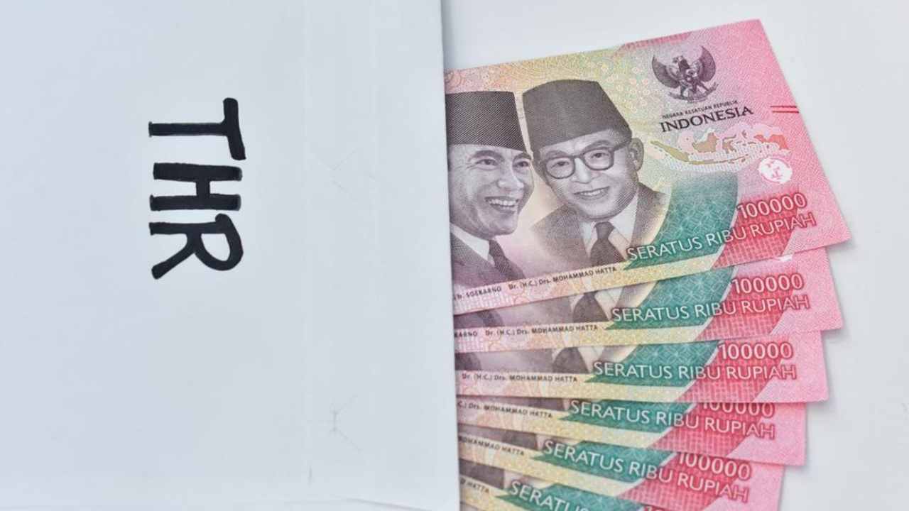 Ilustrasi THR. Foto: dok. Getty Images/Fendi Riandika