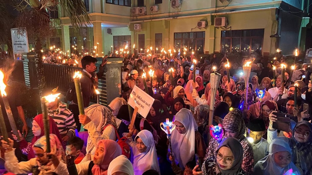 sebanyak 16 Raudatul Athfal (RA) se-Kota Palu dan 10 Madrasah Ibtidaiyah (MI) induk KKM MIN 1 Kota Palu menggelar pawai obor, Rabu, 25 Februari 2025. 